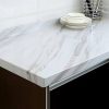 High-speed CNC machine shaping marble edges